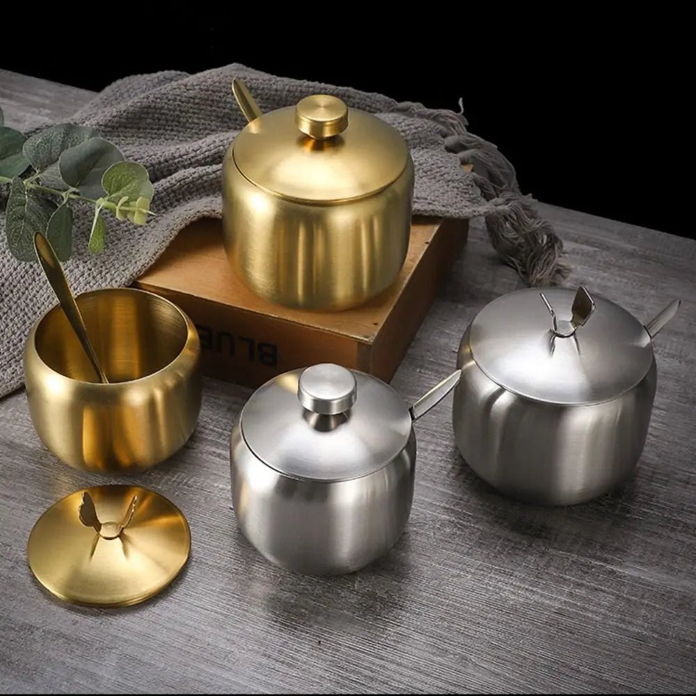 4 pots à épices inox