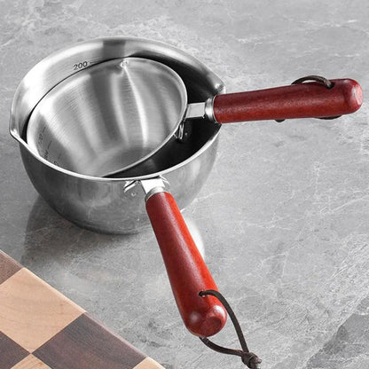 CASSEROLE- À- HUILE- CHAUDE- POUR- ARROSAGE  : sur-plan-de-travail