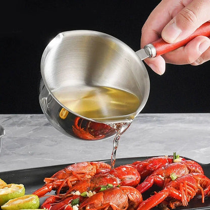 CASSEROLE- À- HUILE- CHAUDE- POUR- ARROSAGE  : verse-huile-sur-homard