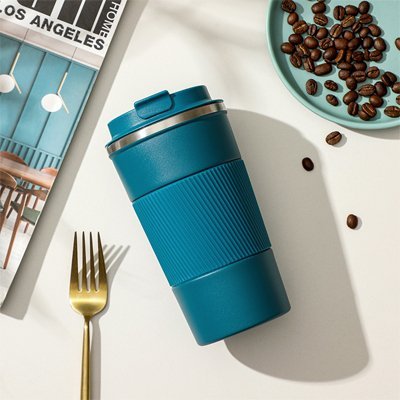Mug - isotherme - en  acier - inoxydable - étanche - Thermo - Pro - coucher - sur - une - table