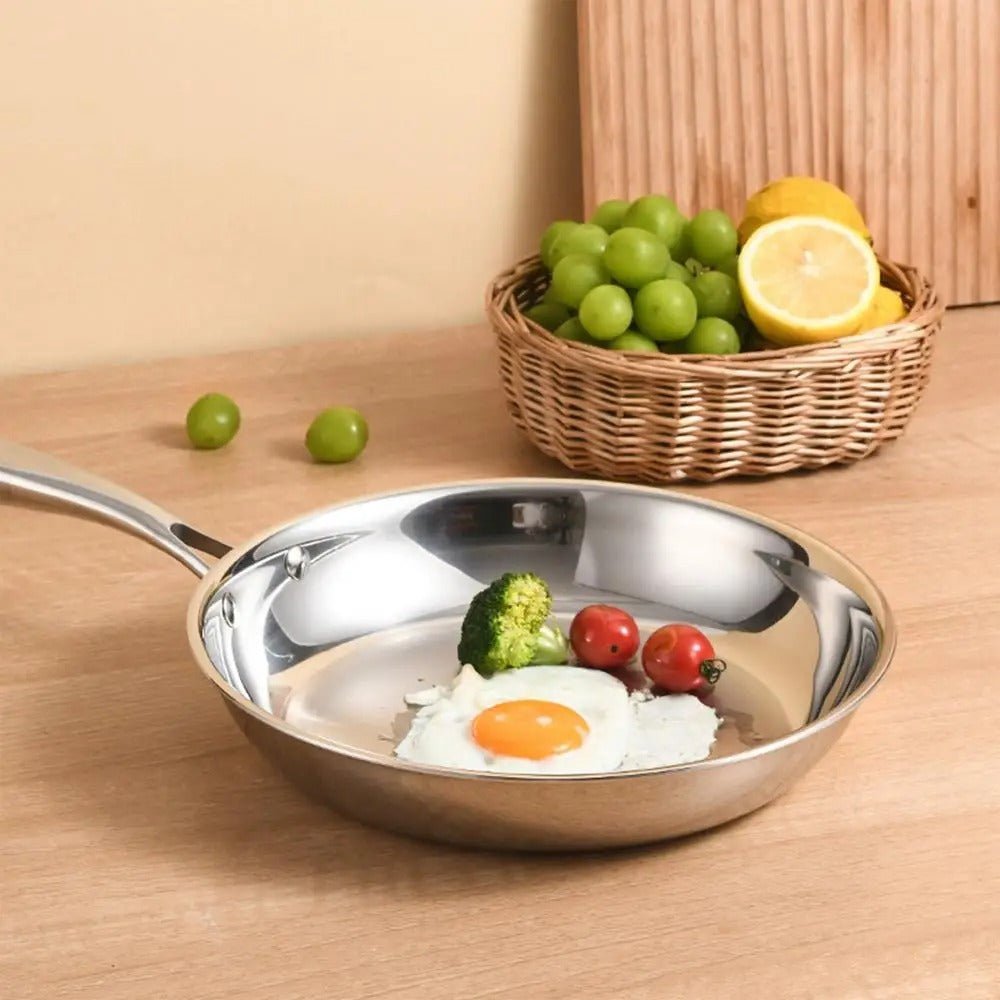 Poêle- en- acier- inoxydable- poli- rond-  induction : cuisson - saine