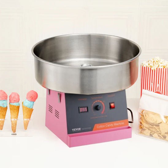 machine à barbe à papa avec popcorn à côté