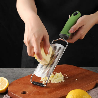 Râpe à fromage et zesteur inox