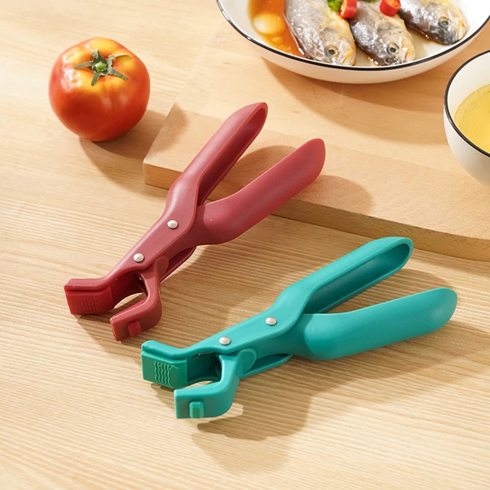 pince anti-brûlure sur table