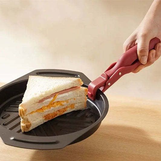 pince tenant un contenant