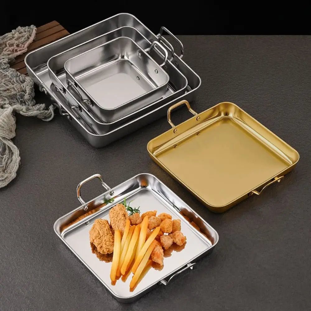plat à four inox argent avec nourriture