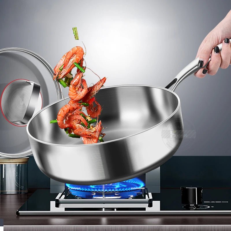 poêle- en- acier- inoxydable- 18/10 - tous- types- de- feux : avec- crevettes- rouge- sur- le- feux