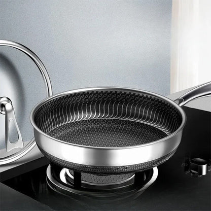 poêle- inox- antiadhésive - Diamètres 28cm- et- 30cm : sur- le- feu- sans- nourriture