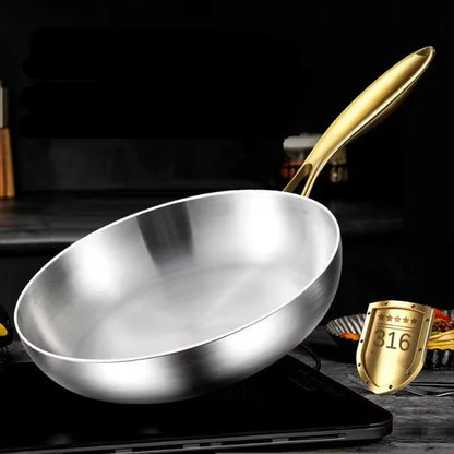poêles- en- inox- 316- cuisson- saine- poignée- dorée- compatible- induction : poêle- sur- plaque- de- cuisson