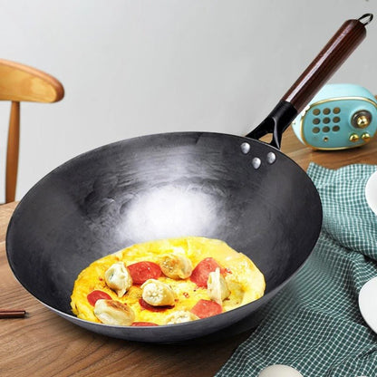 Wok en fer forgé martelé à la main avec fond rond - Prati - Kitchen